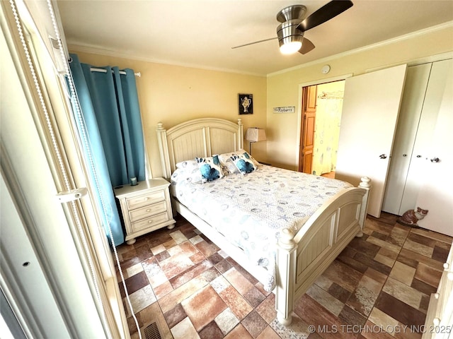 421224 E 1165th Rd, Eufaula, OK 74432 - bedroom featuring crown molding, ceiling fan, and a closet