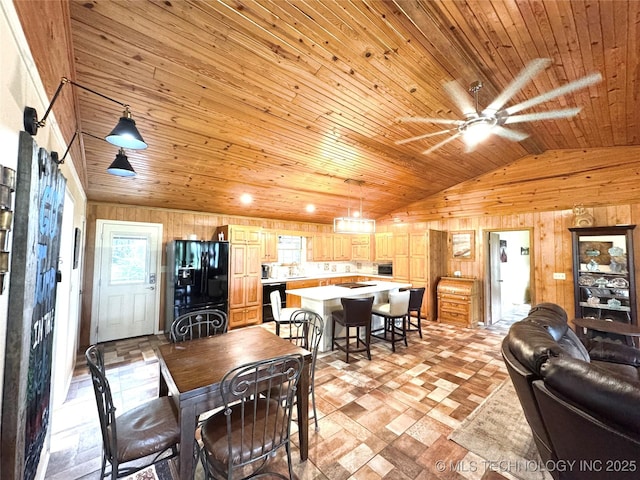 421224 E 1165th Rd, Eufaula, OK 74432 - dining area with wood ceiling, wooden walls, lofted ceiling, and ceiling fan