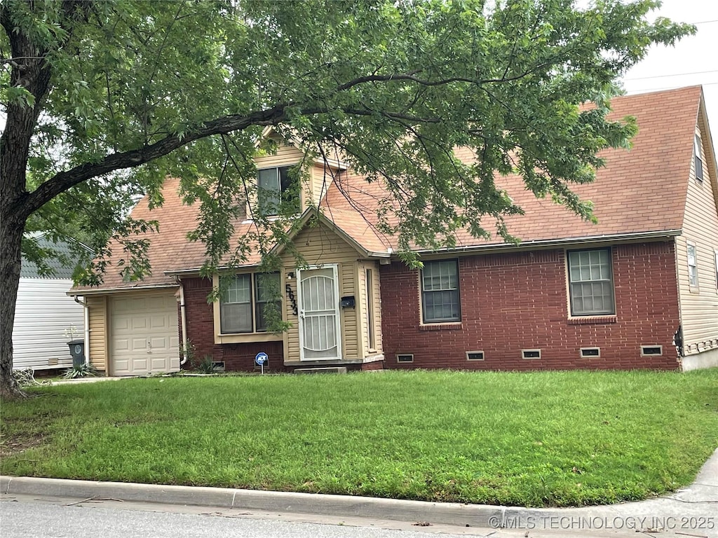 5633 N Garrison Pl, Tulsa, OK 74126 - view of front facade with crawl space, brick siding, and a front yard