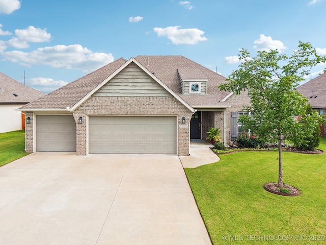 23305 E 104th St S, Broken Arrow, OK 74014 - view of front of property featuring brick siding, a garage, a front yard, concrete driveway, and a shingled roof