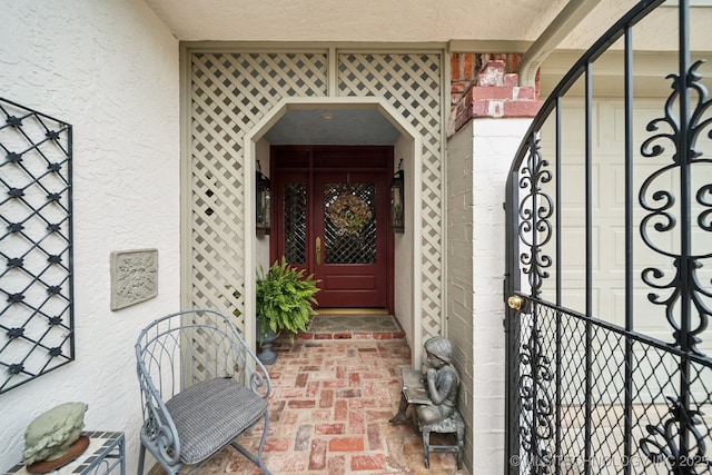 4817 S Yorktown Pl, Tulsa, OK 74105 - doorway to property featuring stucco siding