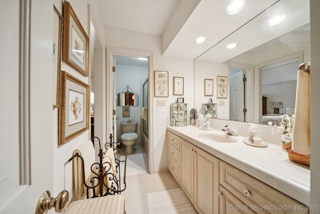 4817 S Yorktown Pl, Tulsa, OK 74105 - ensuite bathroom with vanity, toilet, recessed lighting, tile patterned floors, and  shower combination