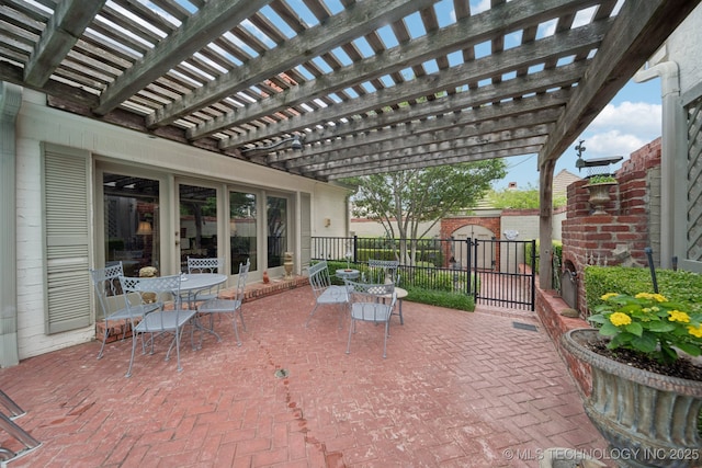 4817 S Yorktown Pl, Tulsa, OK 74105 - view of patio with outdoor dining space, a shed, and a pergola