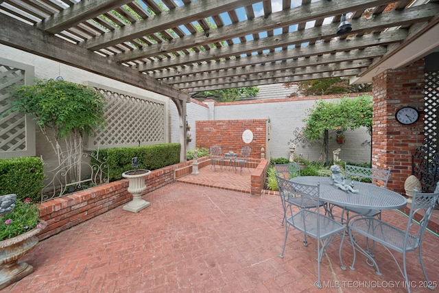 4817 S Yorktown Pl, Tulsa, OK 74105 - view of patio with outdoor dining space and a pergola