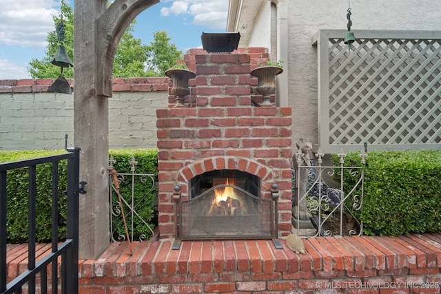 4817 S Yorktown Pl, Tulsa, OK 74105 - exterior view of an outdoor brick fireplace