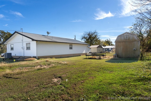 161 N Hickory, Tushka, OK 74525 - view of green lawn with central AC