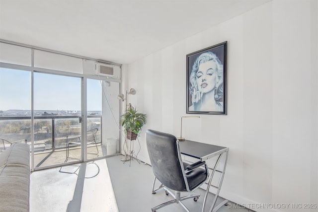 450 W 7th St Unit 1405, Tulsa, OK 74119 - office featuring concrete floors, floor to ceiling windows, and a wall unit AC