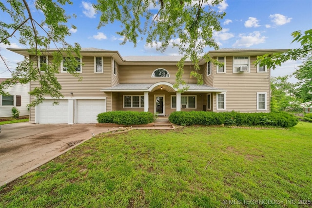 1525 N College Ave, Tulsa, OK 74110 - traditional home featuring an attached garage, driveway, a front yard, and cooling unit