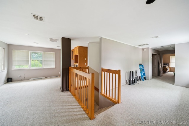 1525 N College Ave, Tulsa, OK 74110 - hall featuring an upstairs landing, carpet floors, and baseboards