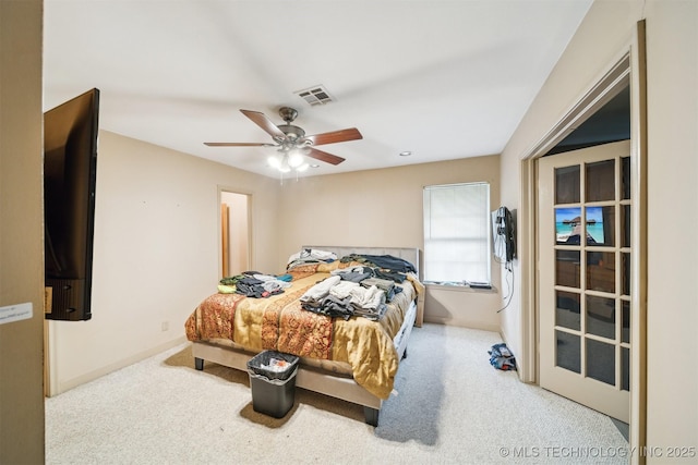 1525 N College Ave, Tulsa, OK 74110 - bedroom with carpet flooring, a ceiling fan, and baseboards