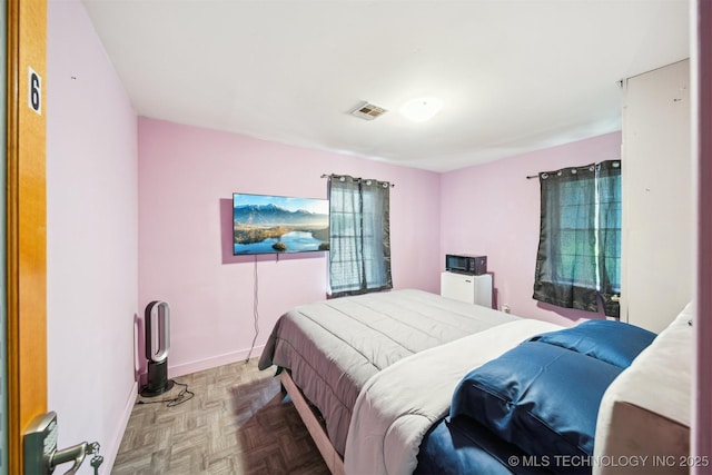 1525 N College Ave, Tulsa, OK 74110 - bedroom featuring baseboards
