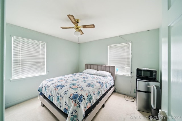 1525 N College Ave, Tulsa, OK 74110 - carpeted bedroom featuring ceiling fan