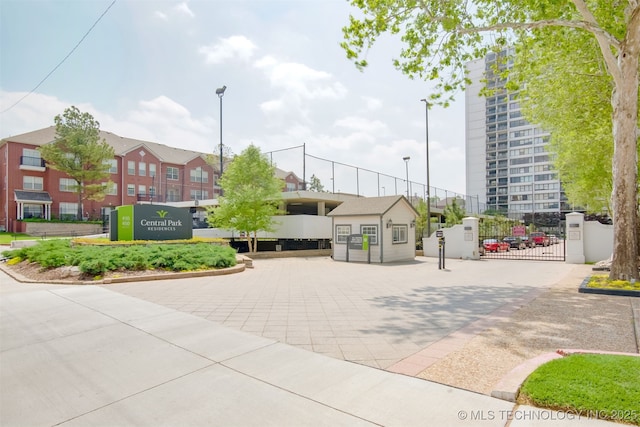 410 W 7th St Unit 1029, Tulsa, OK 74119 - view of community with a gate and a residential view
