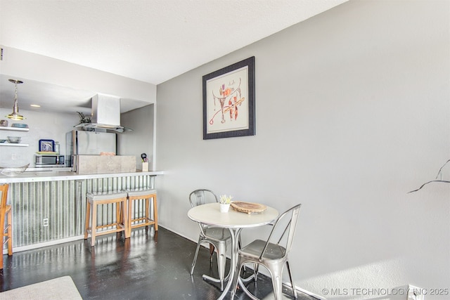 410 W 7th St Unit 1029, Tulsa, OK 74119 - dining space featuring finished concrete flooring