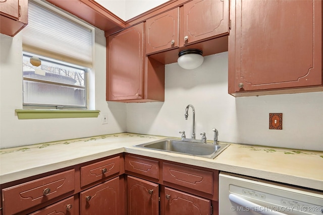 5342 E 47th Pl S Unit 1, Tulsa, OK 74135 - kitchen featuring a sink, dishwasher, and light countertops