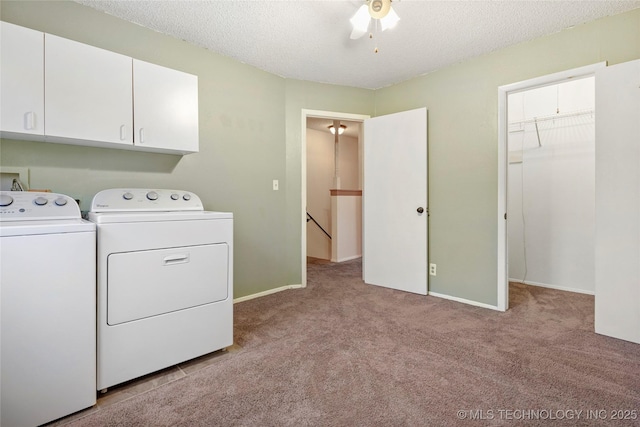 5342 E 47th Pl S Unit 1, Tulsa, OK 74135 - laundry room with washing machine and clothes dryer, cabinet space, light colored carpet, a textured ceiling, and ceiling fan