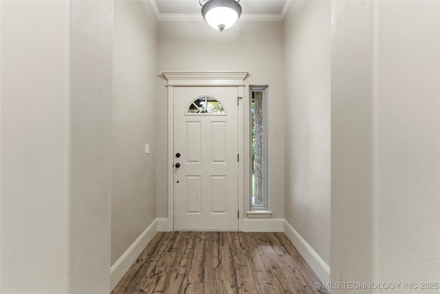 4675 E 144th Pl S, Bixby, OK 74008 - entryway with plenty of natural light, wood finished floors, baseboards, and crown molding