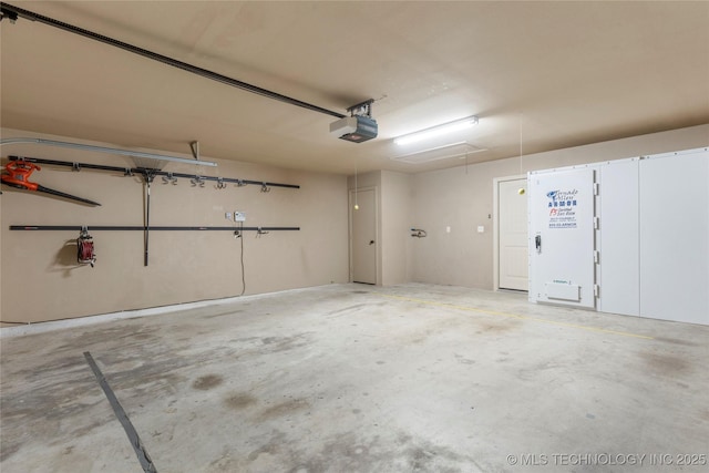 4675 E 144th Pl S, Bixby, OK 74008 - garage featuring a garage door opener