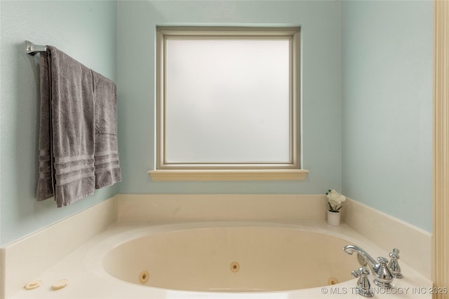 4675 E 144th Pl S, Bixby, OK 74008 - full bathroom featuring a jetted tub and plenty of natural light