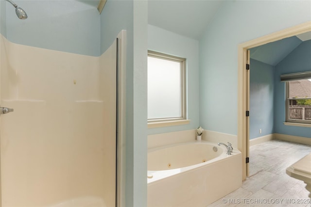4675 E 144th Pl S, Bixby, OK 74008 - full bath featuring a jetted tub, a shower stall, and vaulted ceiling
