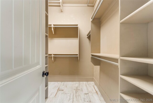 4675 E 144th Pl S, Bixby, OK 74008 - walk in closet with wood finished floors