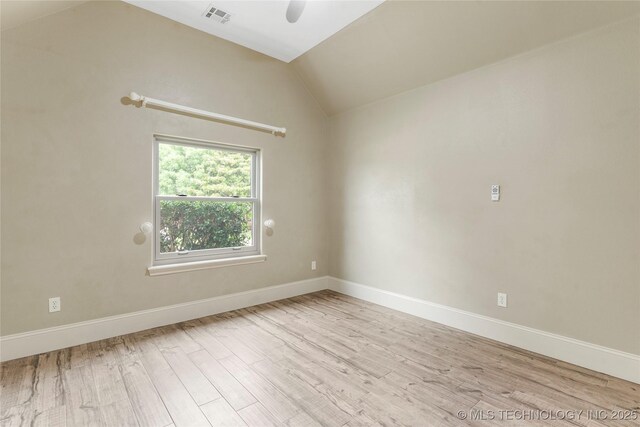 4675 E 144th Pl S, Bixby, OK 74008 - unfurnished room featuring wood finished floors, vaulted ceiling, baseboards, and a ceiling fan