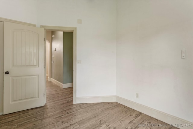 4675 E 144th Pl S, Bixby, OK 74008 - unfurnished room with wood finished floors and baseboards