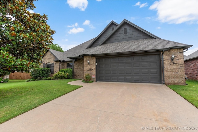 4675 E 144th Pl S, Bixby, OK 74008 - view of front of property featuring brick siding, a front lawn, driveway, and an attached garage