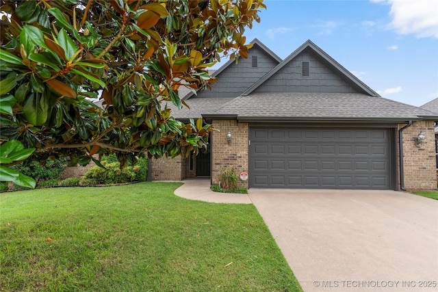4675 E 144th Pl S, Bixby, OK 74008 - view of front of house featuring brick siding, a garage, driveway, and a shingled roof