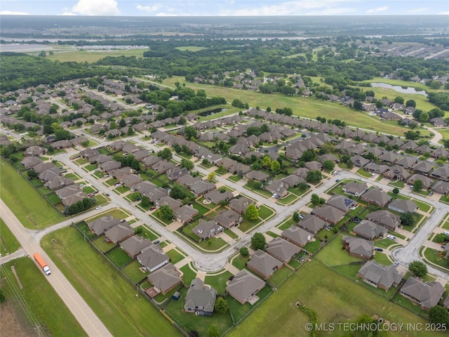 4675 E 144th Pl S, Bixby, OK 74008 - aerial overview of property's location with a nearby body of water and nearby suburban area