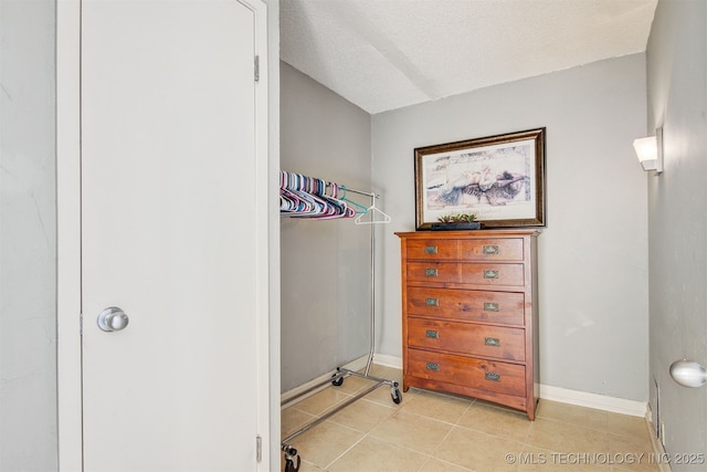 410 W 7th St Unit 1230, Tulsa, OK 74119 - walk in closet featuring light tile patterned floors