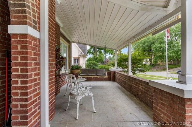 2403 S Troost Ave, Tulsa, OK 74114 - view of covered porch