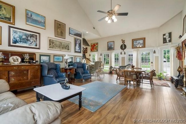 2403 S Troost Ave, Tulsa, OK 74114 - living room featuring high vaulted ceiling, ceiling fan, and wood finished floors