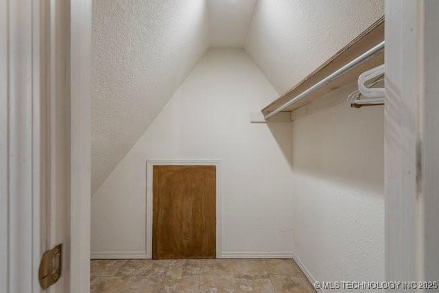 2403 S Troost Ave, Tulsa, OK 74114 - spacious closet with lofted ceiling