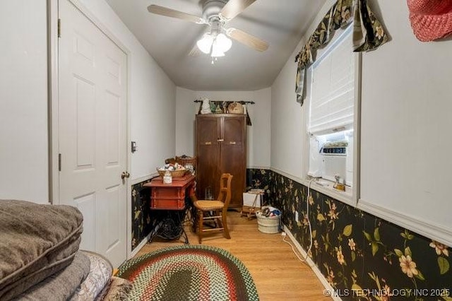 2403 S Troost Ave, Tulsa, OK 74114 - living area featuring wood finished floors and ceiling fan