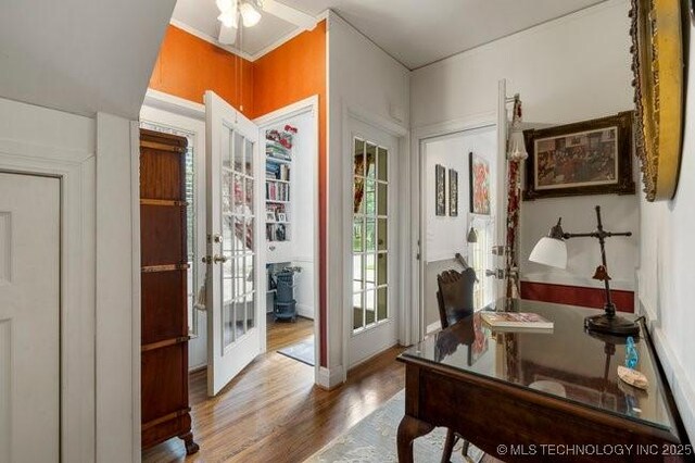 2403 S Troost Ave, Tulsa, OK 74114 - home office featuring french doors, wood finished floors, and baseboards