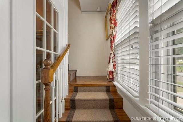 2403 S Troost Ave, Tulsa, OK 74114 - staircase featuring wood finished floors