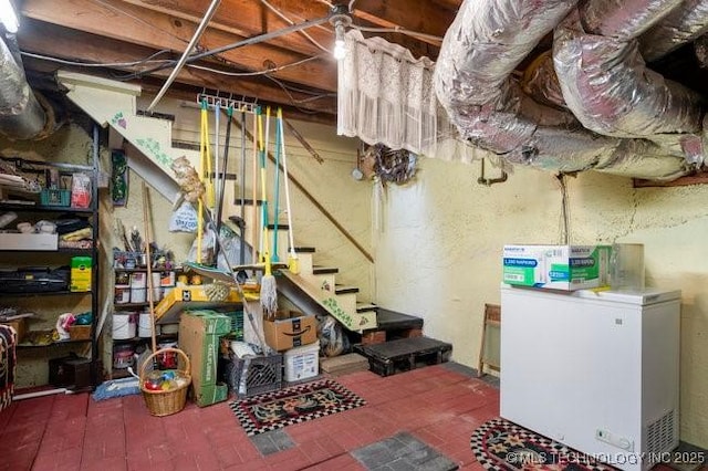 2403 S Troost Ave, Tulsa, OK 74114 - unfinished basement with brick patterned flooring