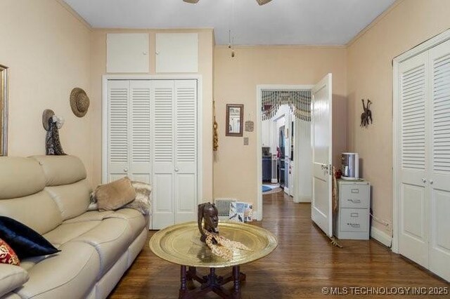 2403 S Troost Ave, Tulsa, OK 74114 - living area featuring ceiling fan and wood finished floors
