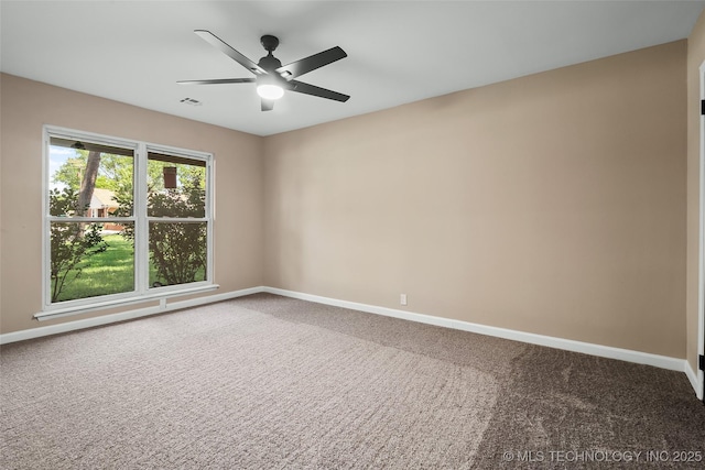 1320 S 99th E Ave, Tulsa, OK 74128 - unfurnished room with baseboards, carpet flooring, and a ceiling fan