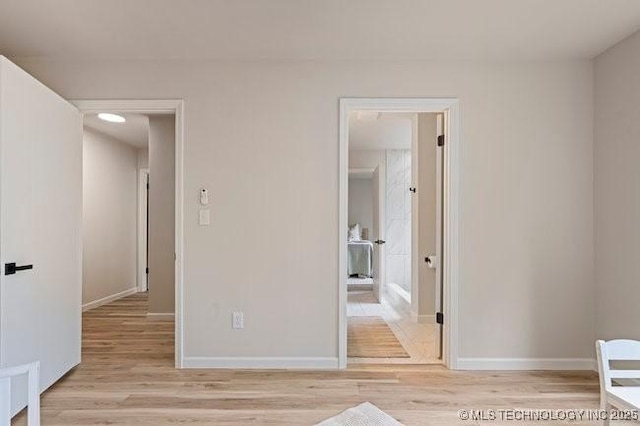 2223 E 54th St, Tulsa, OK 74105 - empty room with light wood-type flooring and baseboards