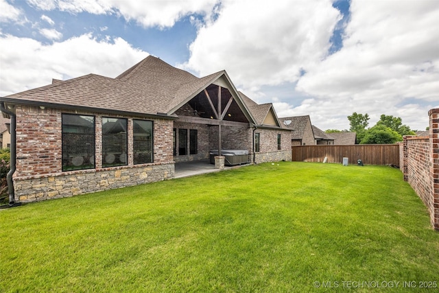 3805 S Tamarack Ave, Broken Arrow, OK 74011 - rear view of property with a hot tub, roof with shingles, a patio, and brick siding