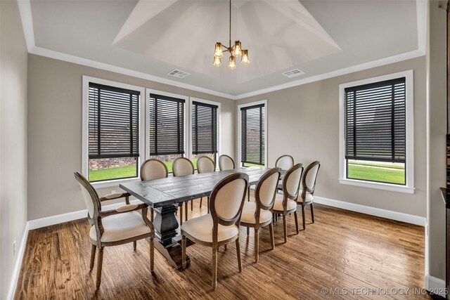 3805 S Tamarack Ave, Broken Arrow, OK 74011 - dining area featuring a chandelier, baseboards, plenty of natural light, ornamental molding, and wood finished floors