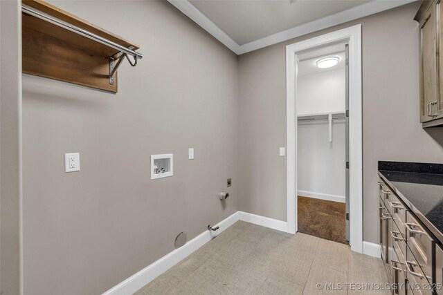 3805 S Tamarack Ave, Broken Arrow, OK 74011 - laundry room featuring hookup for a gas dryer, electric dryer hookup, washer hookup, baseboards, and light colored carpet