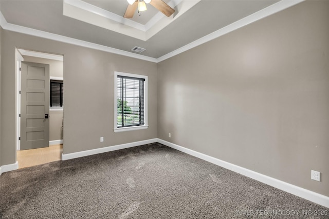 3805 S Tamarack Ave, Broken Arrow, OK 74011 - carpeted empty room featuring a raised ceiling, a ceiling fan, baseboards, and crown molding