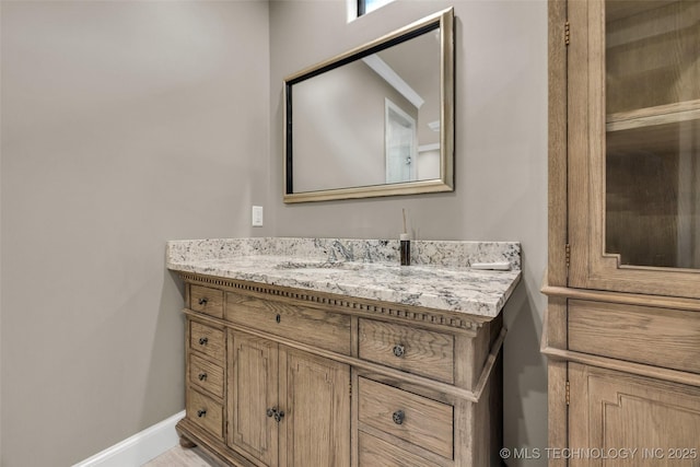 3805 S Tamarack Ave, Broken Arrow, OK 74011 - bathroom featuring vanity and baseboards