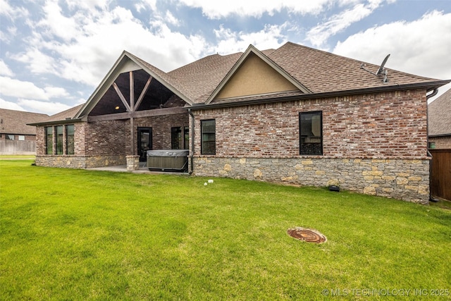 3805 S Tamarack Ave, Broken Arrow, OK 74011 - back of property with a shingled roof, a patio, a hot tub, and brick siding