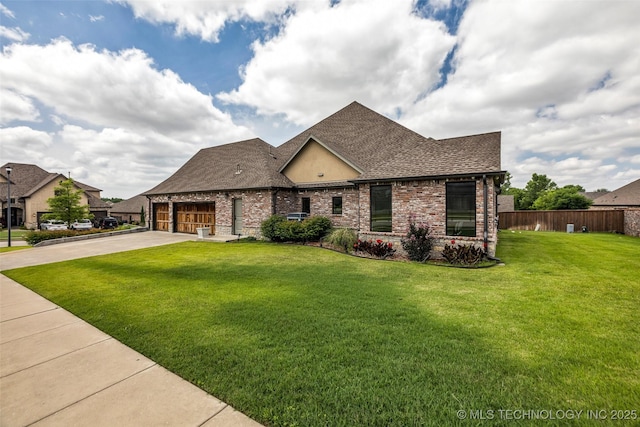 3805 S Tamarack Ave, Broken Arrow, OK 74011 - french country inspired facade featuring roof with shingles, driveway, brick siding, and a garage