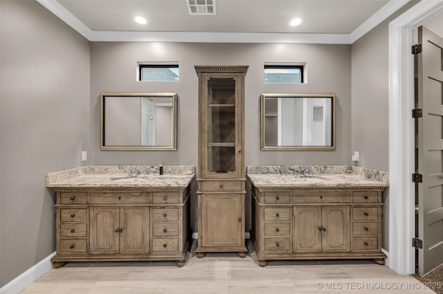 3805 S Tamarack Ave, Broken Arrow, OK 74011 - full bathroom featuring two vanities, baseboards, and recessed lighting
