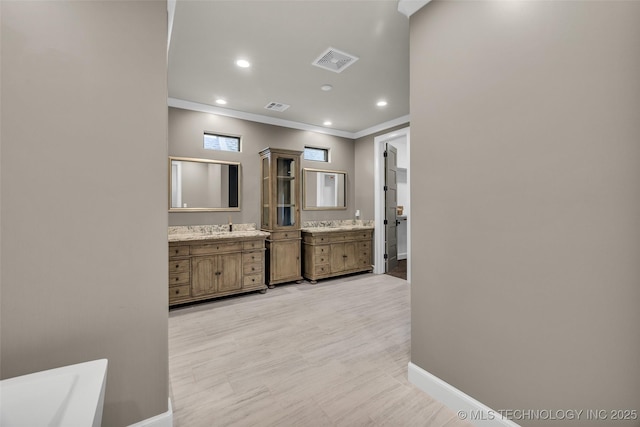 3805 S Tamarack Ave, Broken Arrow, OK 74011 - bathroom featuring crown molding, vanity, recessed lighting, and baseboards
